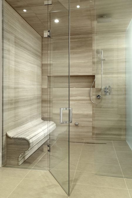 x white tiles line all the bathroom walls and floors same open shower ideas glass showers