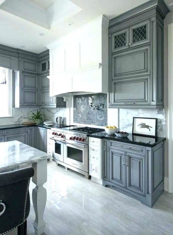 Exquisite gray kitchen with sparkling pendant lighting [Design: Romanelli & Hughes Custom Home Builders